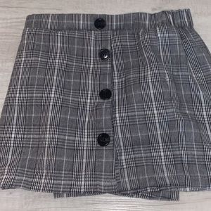 Plaid skirt with black bottoms